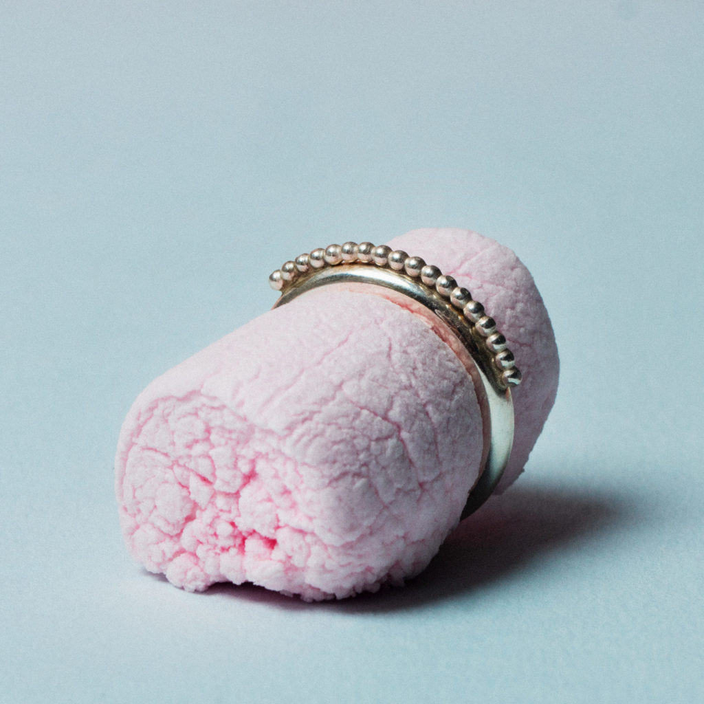 Silver ring and pink marshmallow